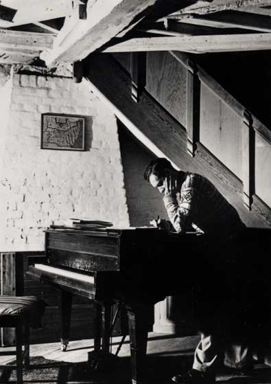 Britten at his piano